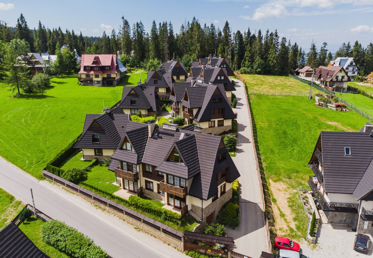 Ferienwohnung in Zakopane - Appartment Osada Gubałówka 199F/1 mit Terrasse und Bergblick