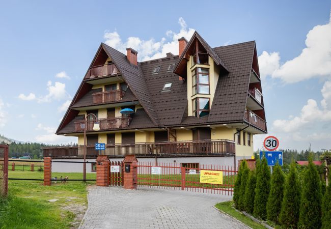 Ferienwohnung in Kościelisko -  Nędzy Kubińca 330B/2, 2-Zimmer-Wohnung mit Balkon und Parkplatz, Kościelisko