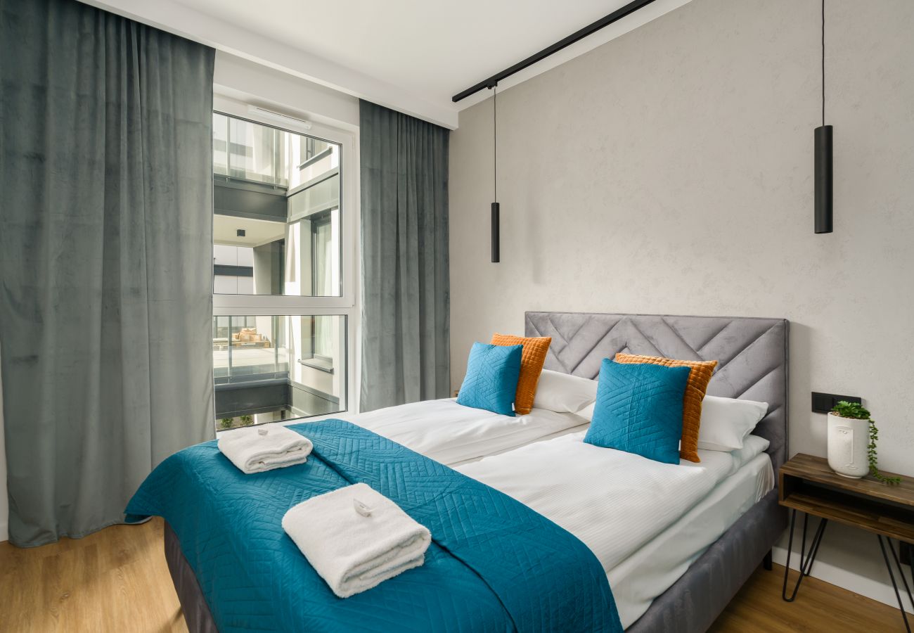 Ferienwohnung in Poznań - Św. Wawrzyńca 15/108, 1 Schlafzimmer, Balkon, Parkingplatz