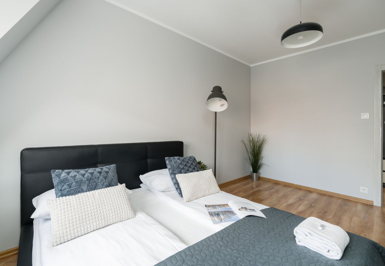 Ferienwohnung in Poznań - Różana 19/131, 1 Schlafzimmer, Balkon