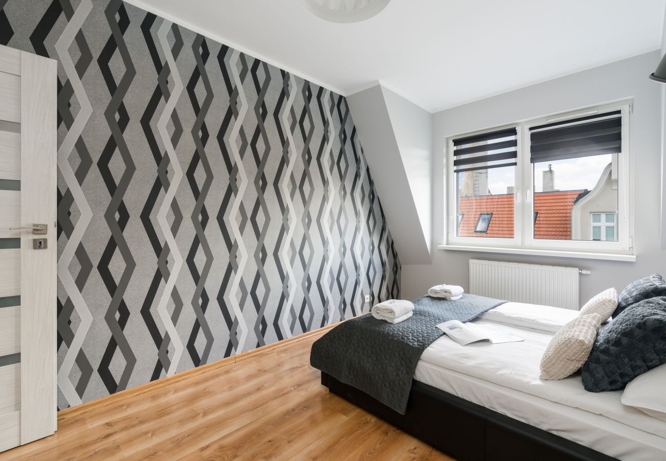 Ferienwohnung in Poznań - Różana 19/131, 1 Schlafzimmer, Balkon