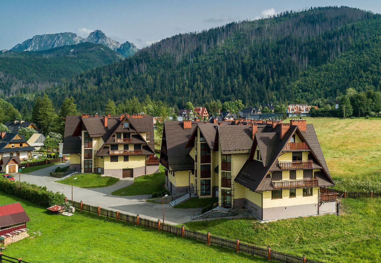 Ferienwohnung in Kościelisko - Gemütliche Familienwohnung mit Balkon und Parkplatz