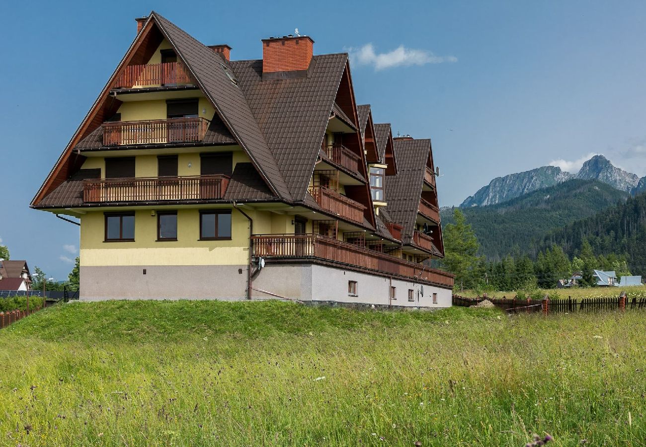 Ferienwohnung in Kościelisko - Gemütliche Familienwohnung mit Balkon und Parkplatz