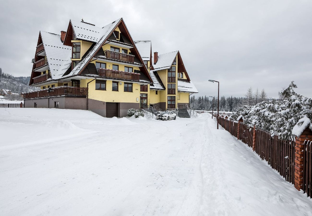 Ferienwohnung in Kościelisko - Gemütliche Familienwohnung mit Balkon und Parkplatz