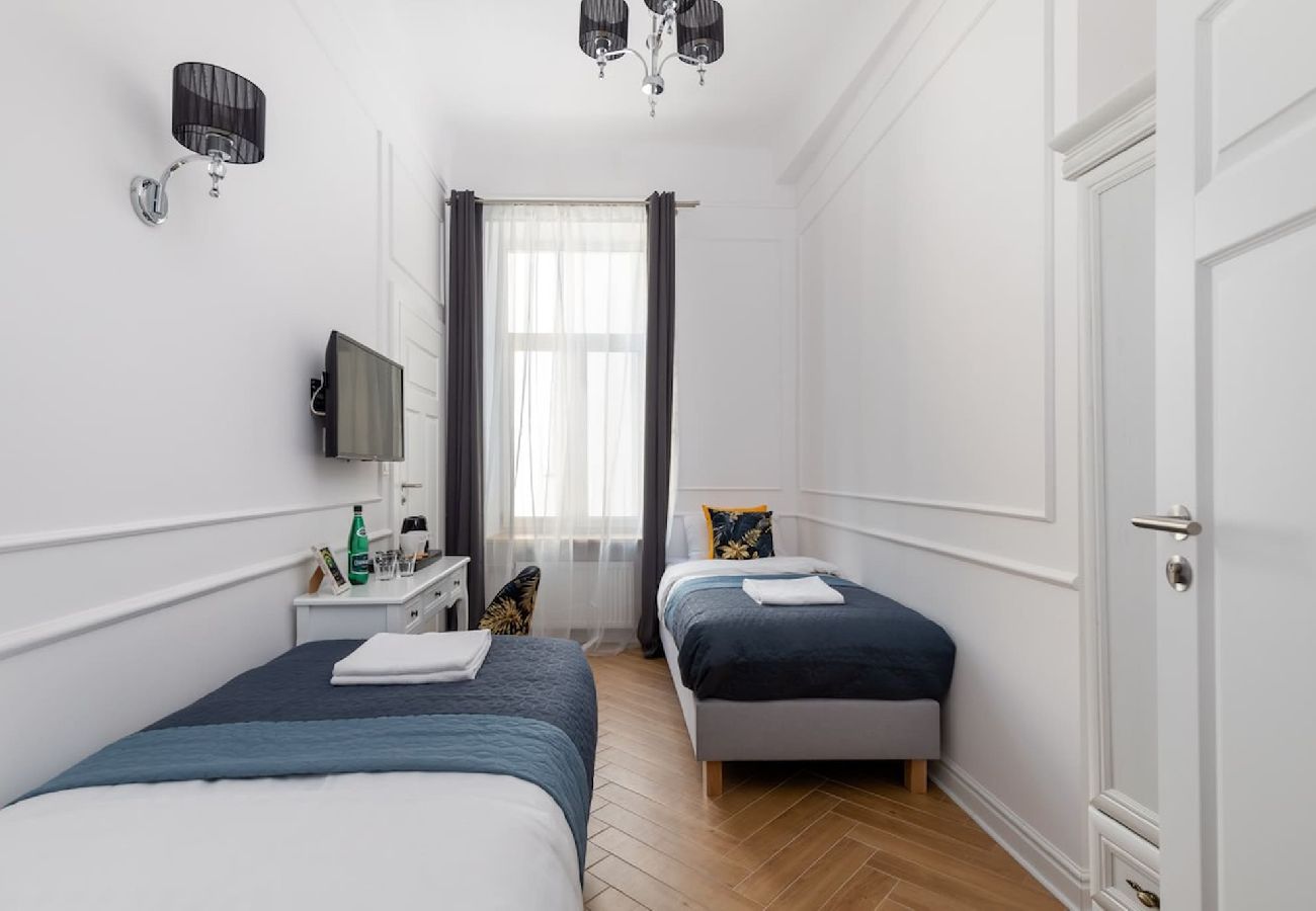 Studio in Warszawa - Lwowska 9  Elegantes Zimmer für zwei Personen mit zwei Einzelbetten 