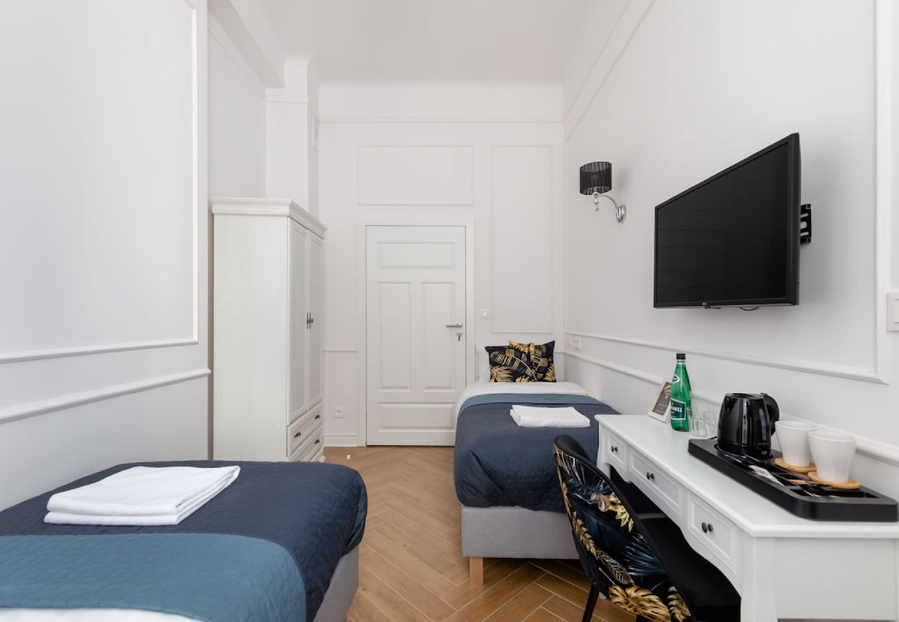 Studio in Warszawa - Lwowska 9  Elegantes Zimmer für zwei Personen mit zwei Einzelbetten 