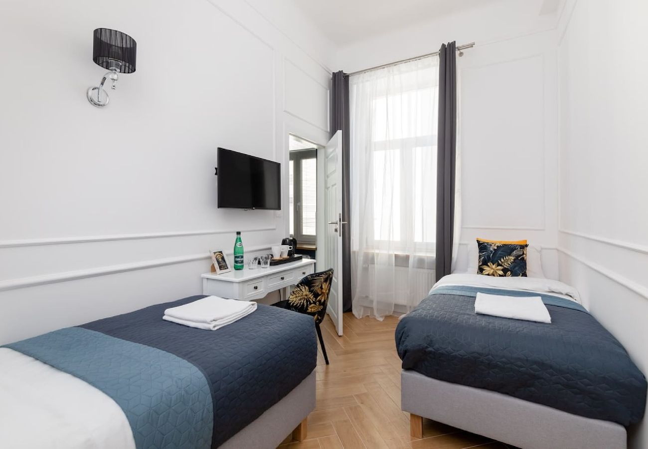 Studio in Warszawa - Lwowska 9  Elegantes Zimmer für zwei Personen mit zwei Einzelbetten 