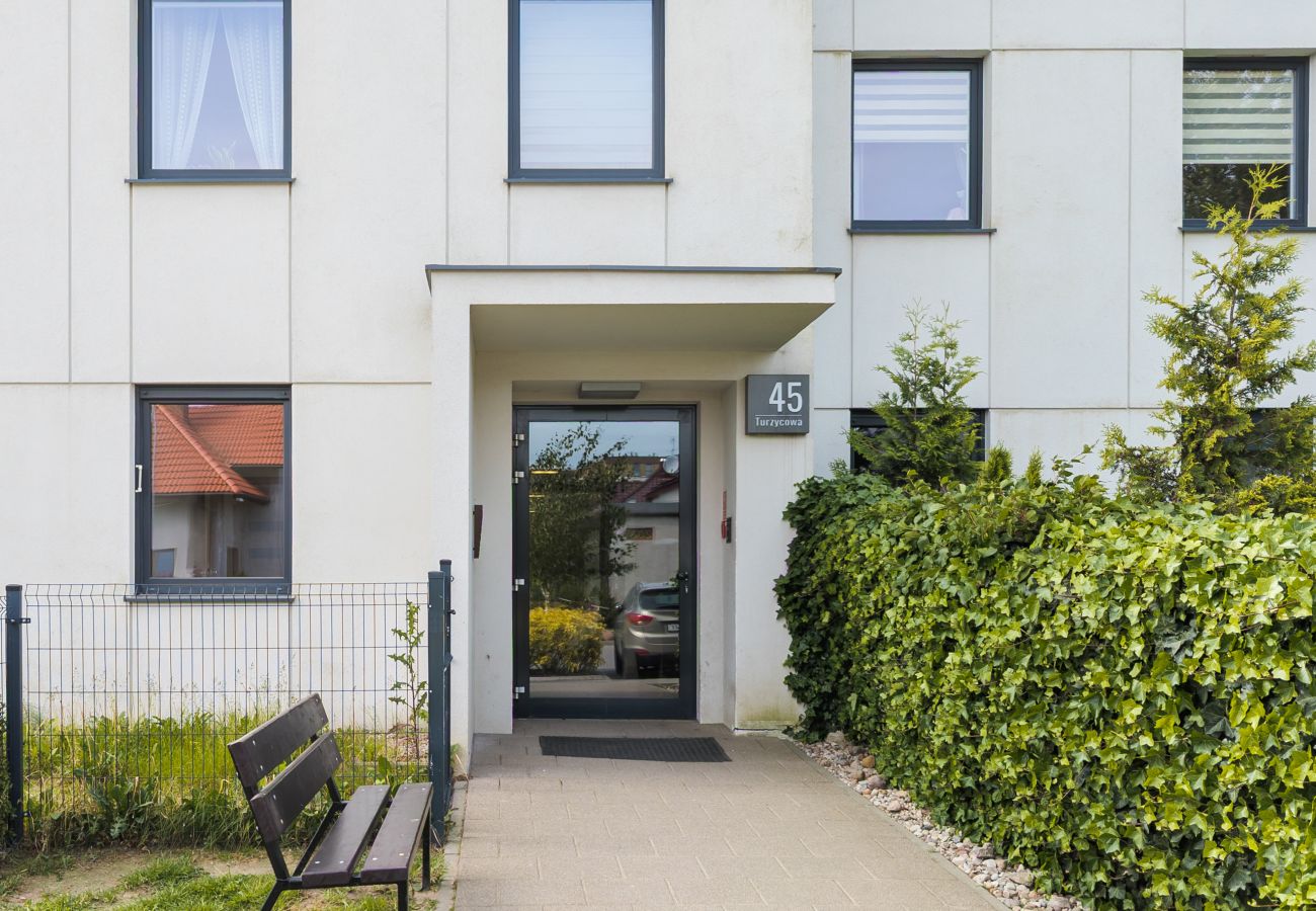 Ferienwohnung in Gdańsk - Modernes Pastell-Apartment mit 1 Schlafzimmer & Parkplatz