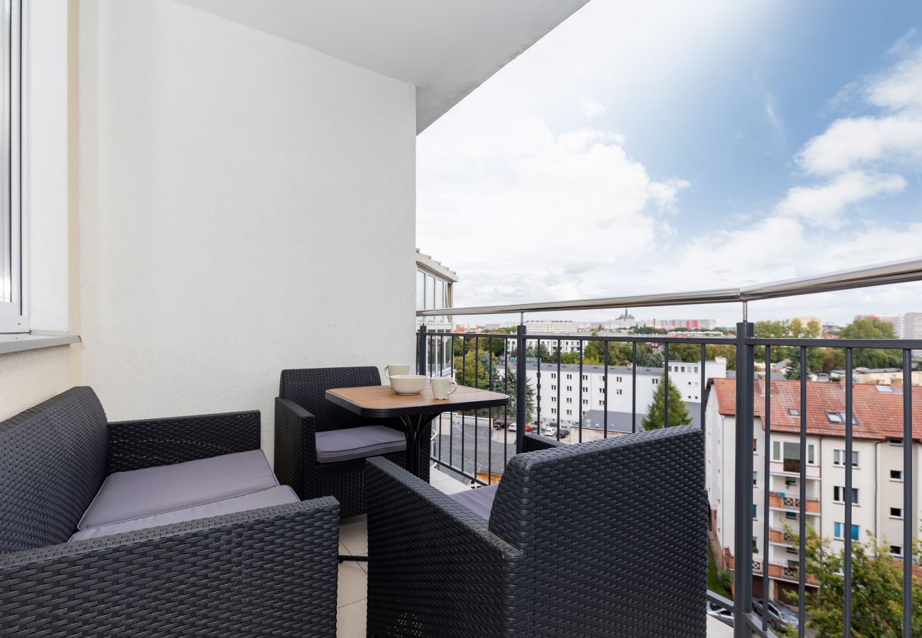 balcony, chairs, table, outside, outside view, city view, railing, rent