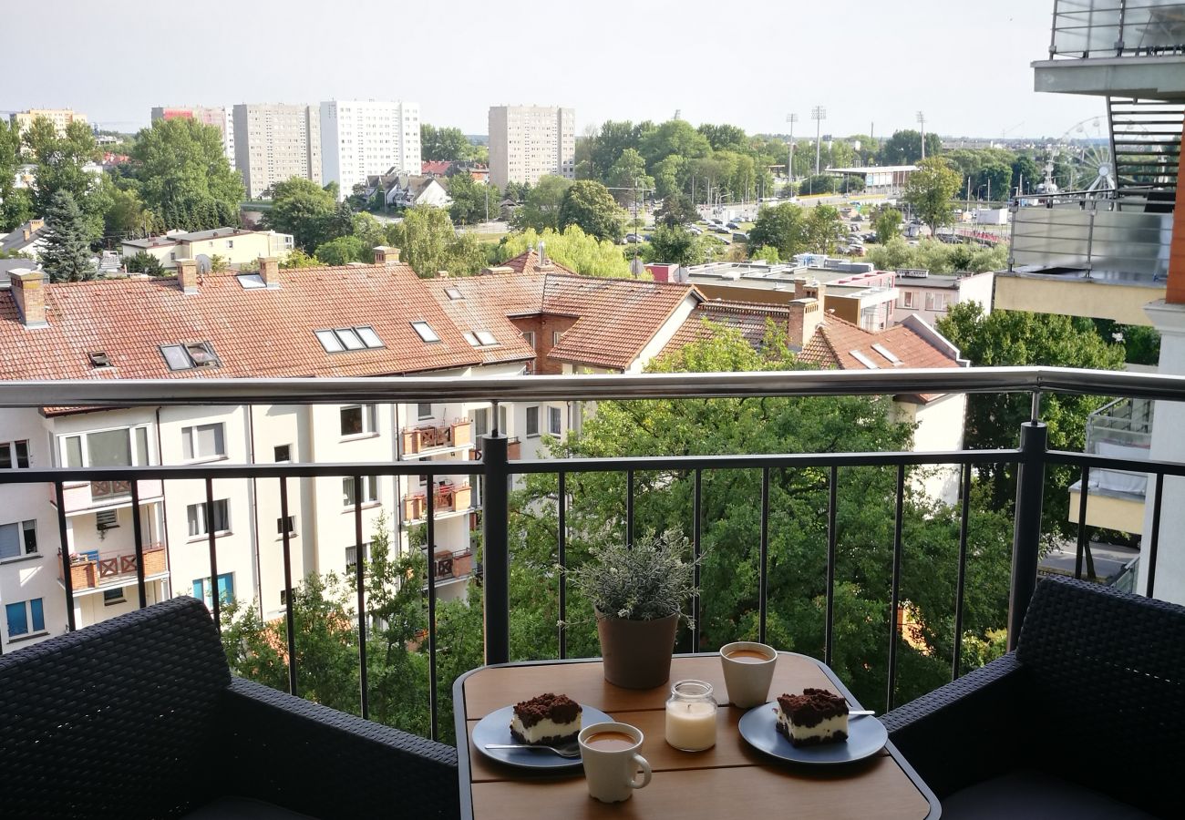 balcony, chairs, table, outside, outside view, city view, railing, rent