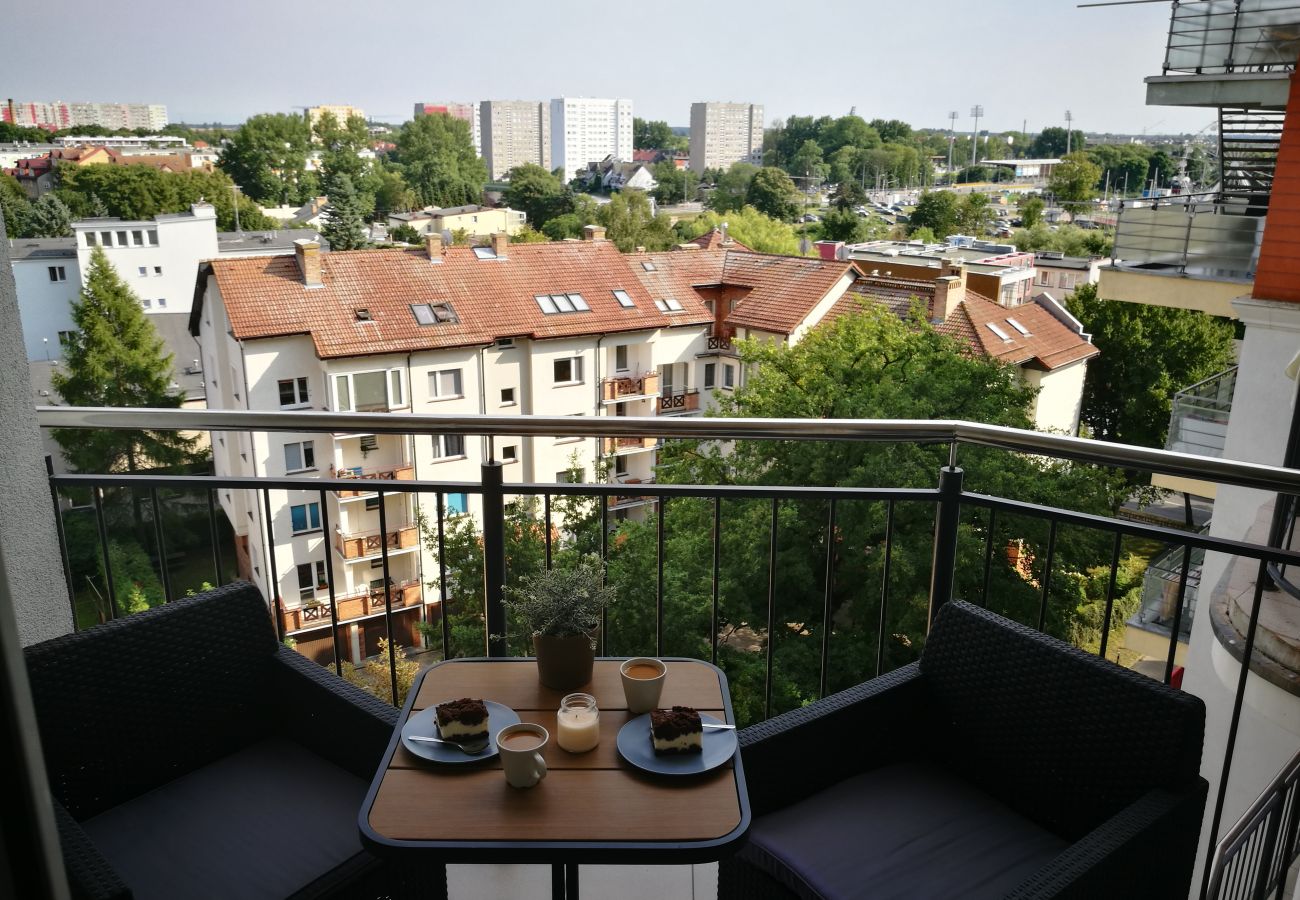 balcony, chairs, table, outside, outside view, city view, railing, rent