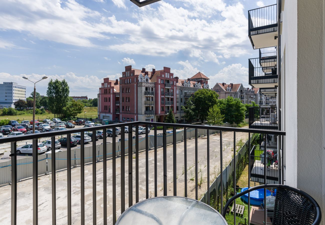 Apartment in Poznań -  Esencja Apartments Garbary 104D | Balcony, Private parking space