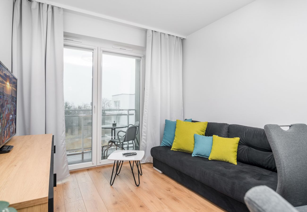 salon, sofa, stolik kawowy, telewizor, jadalnia, apartament, wnętrze mieszkania, wnętrze, wynajem