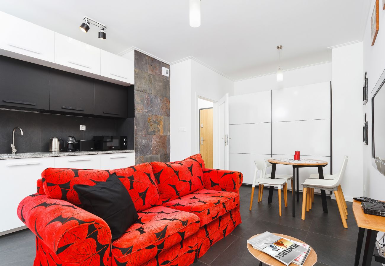 salon, sofa, telewizor, jadalnia, stół, krzesła, aneks kuchenny, apartament, wnętrze, wynajem