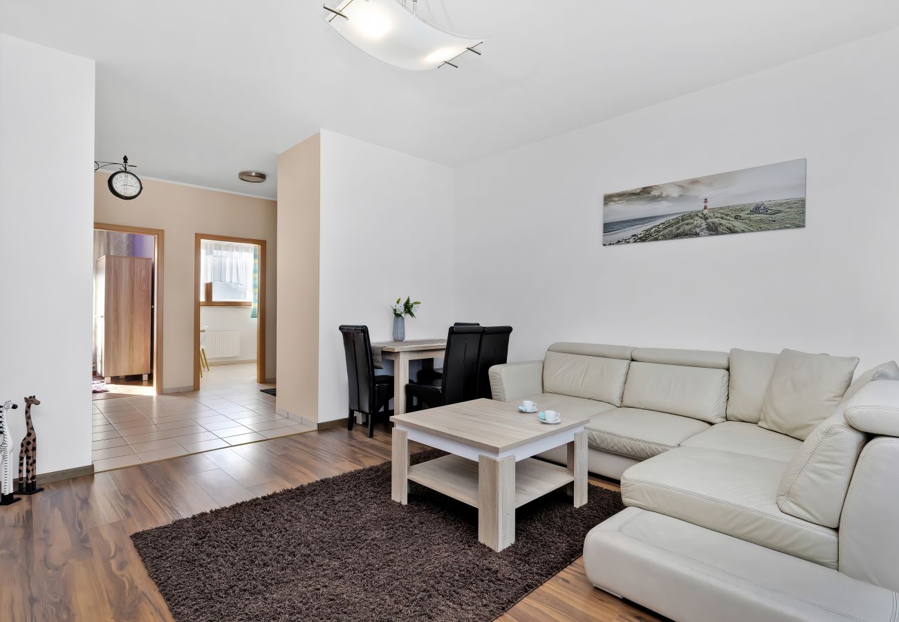 salon, sofa, stolik kawowy, telewizor, stół, krzesła, jadalnia, mieszkanie, wnętrze, wynajem, apartament