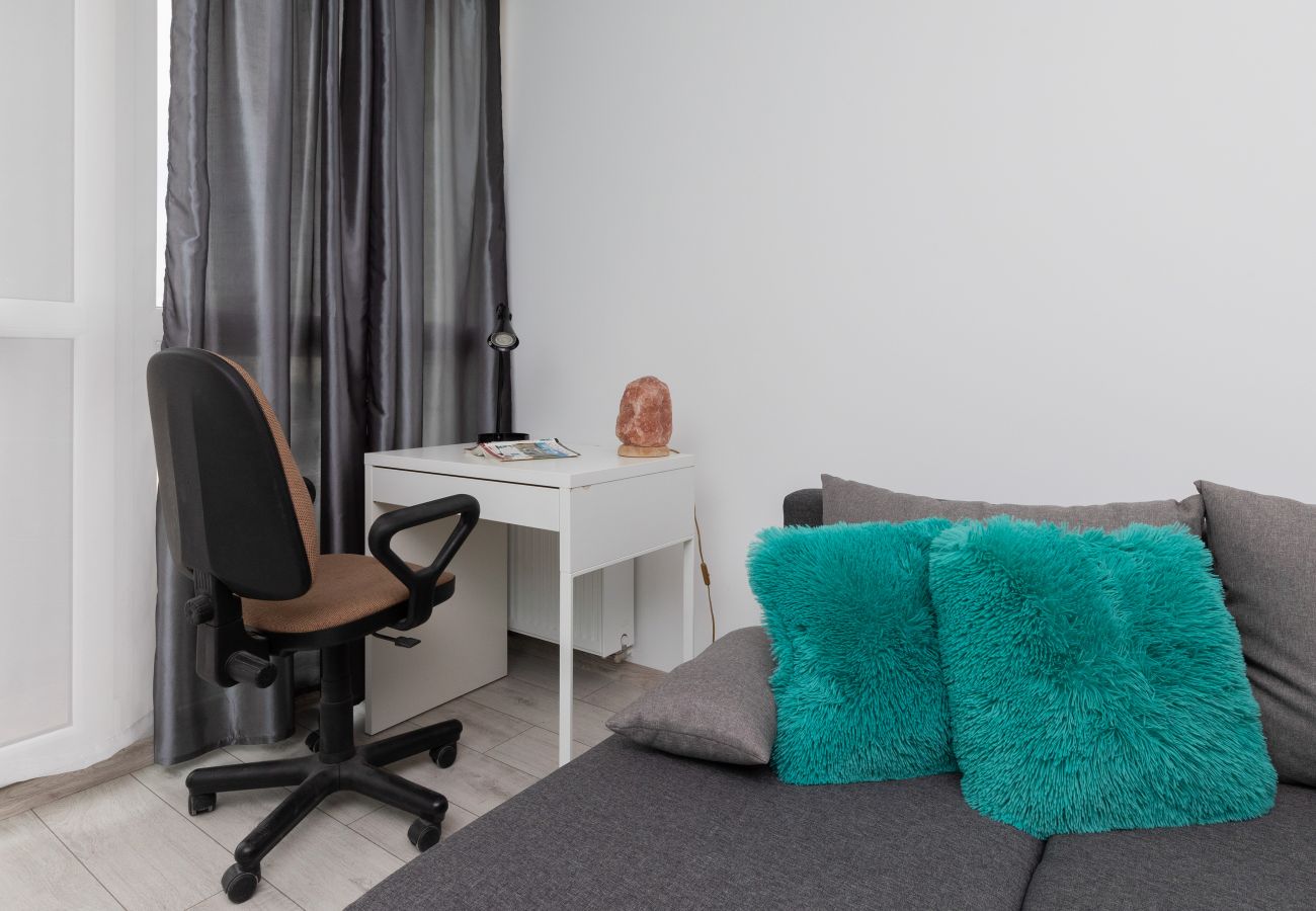 Apartament w Gdańsk - Nowoczesny Pastelowy Apartament z 1 Sypialnią i Miejscem Parkingowym