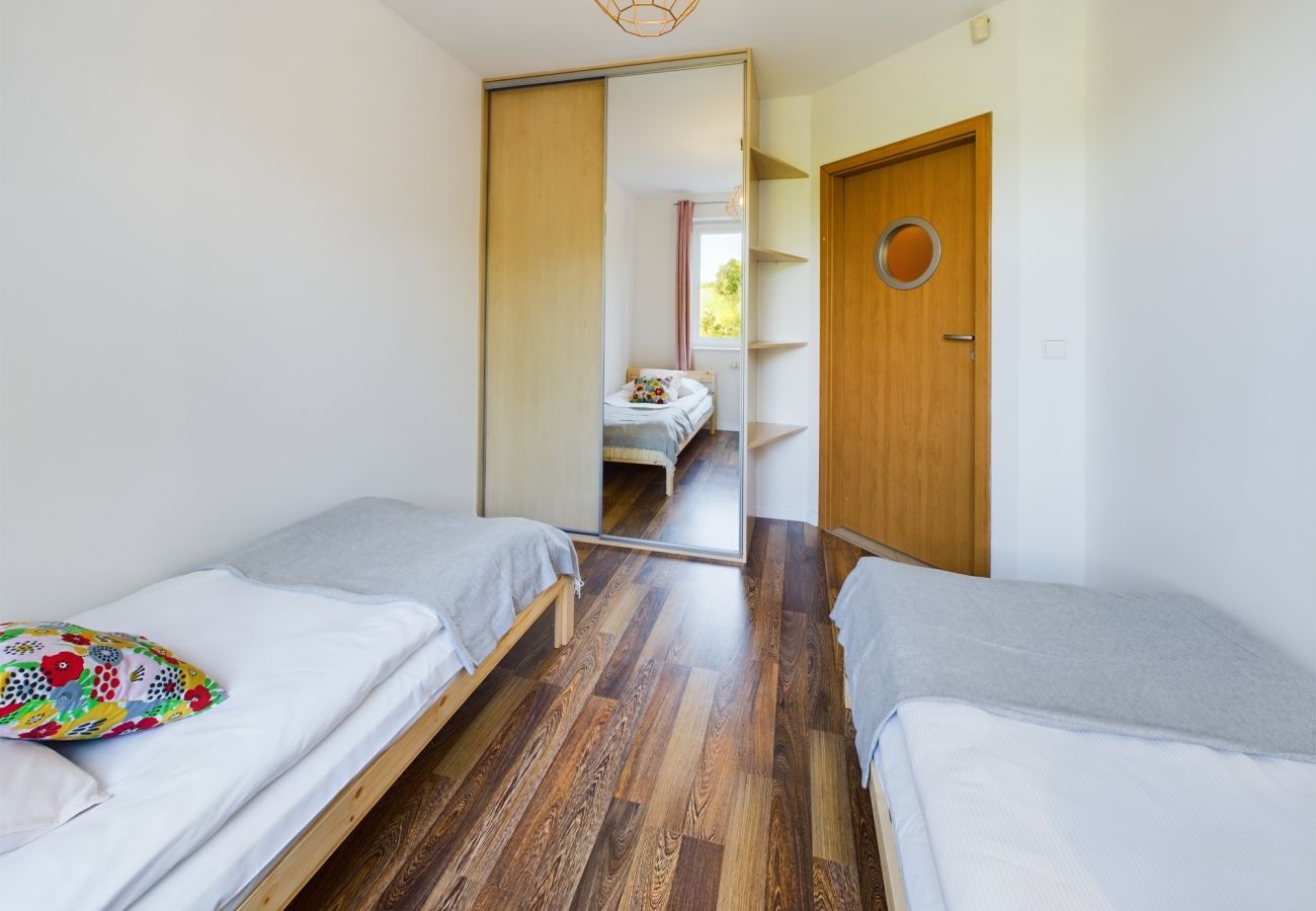 Apartament w Gdańsk - Elegancki Apartament | Przytulna | Gdańsk | Taras | Ogród | Praca Zdalna | Dla 6 | Jedna Sypialnia